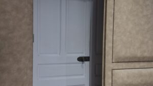 La porte capitonnée